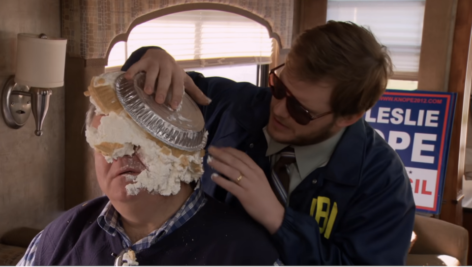 Andy dropping a pie on Jerry's head