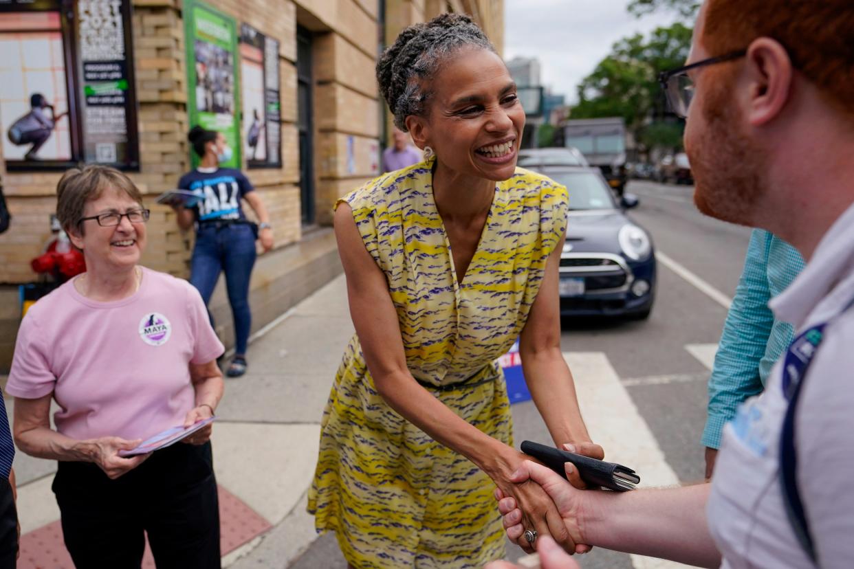 Democratic mayoral candidate Maya Wiley, center, is joined by New York State Assemblymember Deborah Glick, left, as she greets voters during a campaign stop near a polling place in the West Village neighborhood of New York on Tuesday, June 22, 2021.