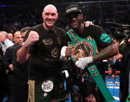 Boxing - Deontay Wilder v Tyson Fury - WBC World Heavyweight Title - Staples Centre, Los Angeles, United States - December 1, 2018 Deontay Wilder and Tyson Fury after the fight Action Images via Reuters/Andrew Couldridge