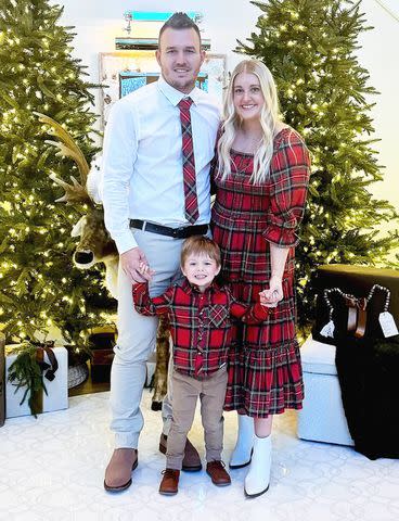 <p>Jess Tara Trout/Instagram</p> Mike Trout, Jessica Cox, and their 3-year-old son Beckham pose for a holiday family photo