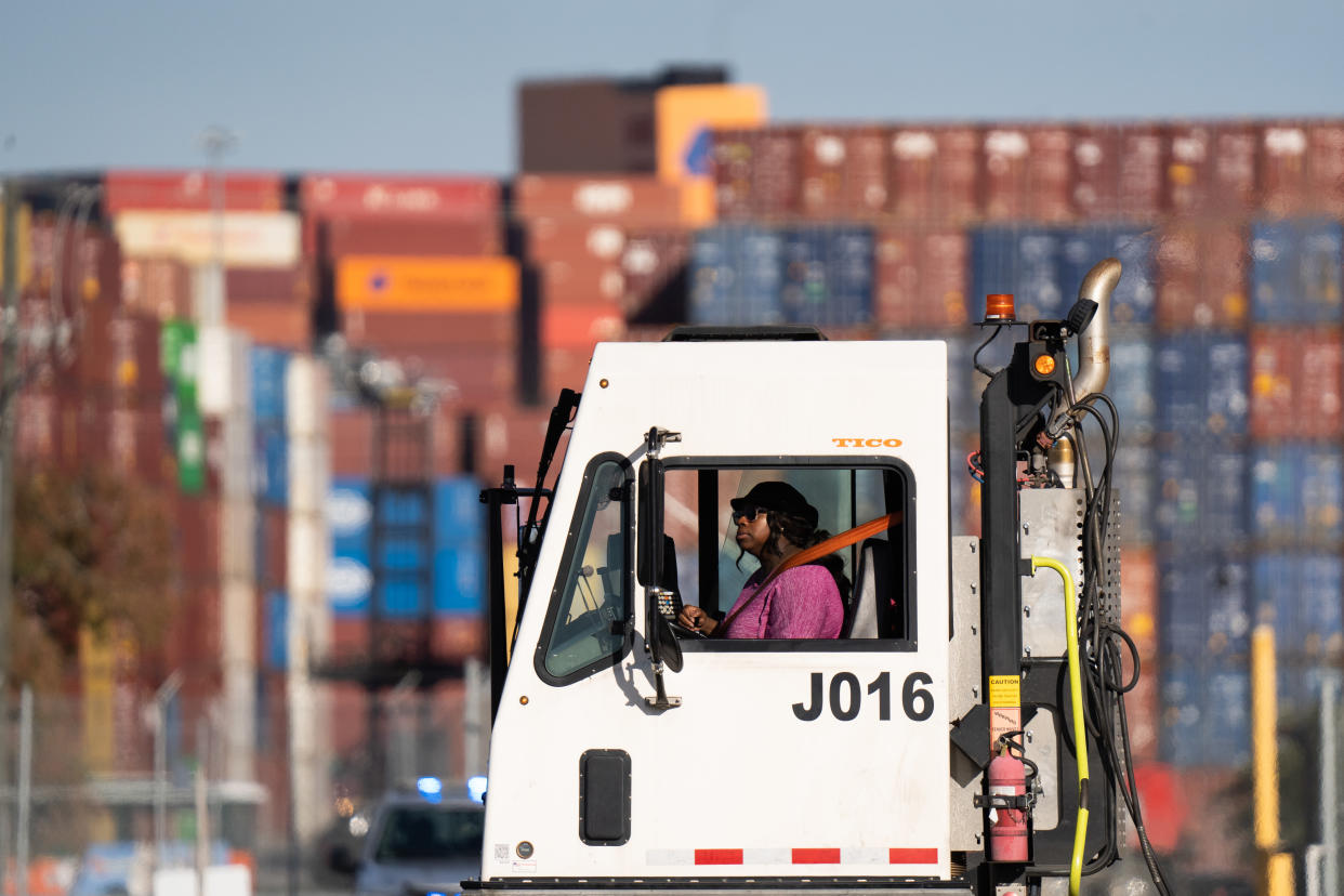 GARDEN CITY, GA - NOVEMBER 12: A jockey truck driver navigates through the Garden City Port Terminal on November 12, 2021 in Garden City, Georgia. The terminal recently completed construction of the Mason Mega Rail Station, doubling the Port of Savannahs rail lift capacity to one million containers per year. (Photo by Sean Rayford/Getty Images)