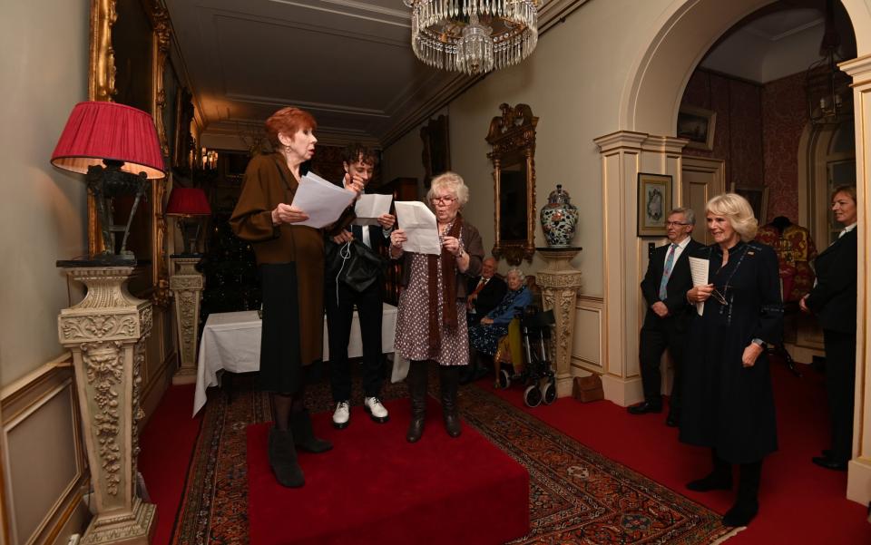 Carole Boyd, Sunny Ormonde and Ben Norris perform a skit for the Duchess of Cornwall - Kate Green/PA Pool/Getty Images