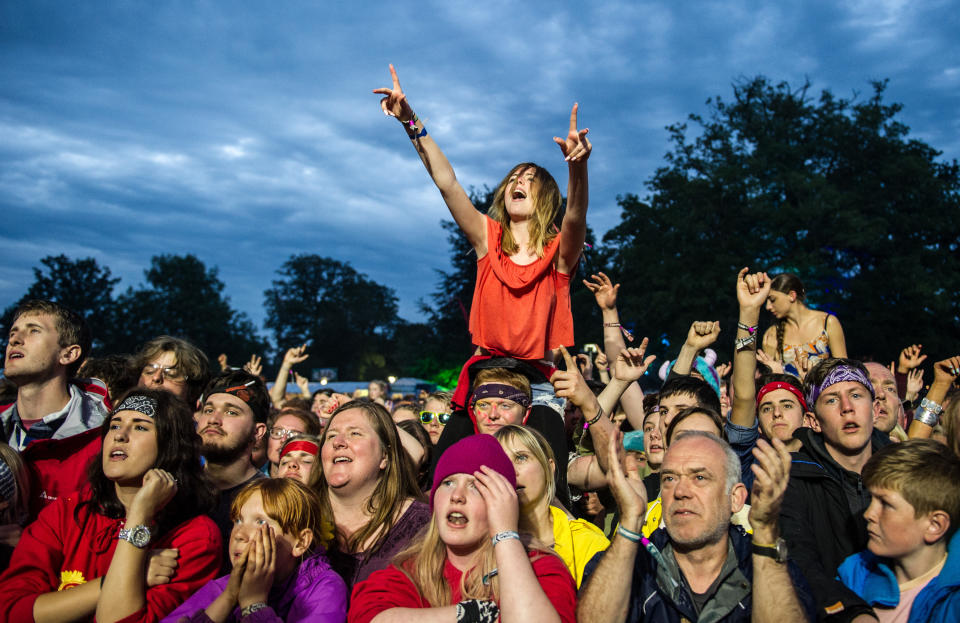 Festival goers at Kendal Calling festival at Lowther Deer Park on August 08, 2015 in Kendal, United Kingdom