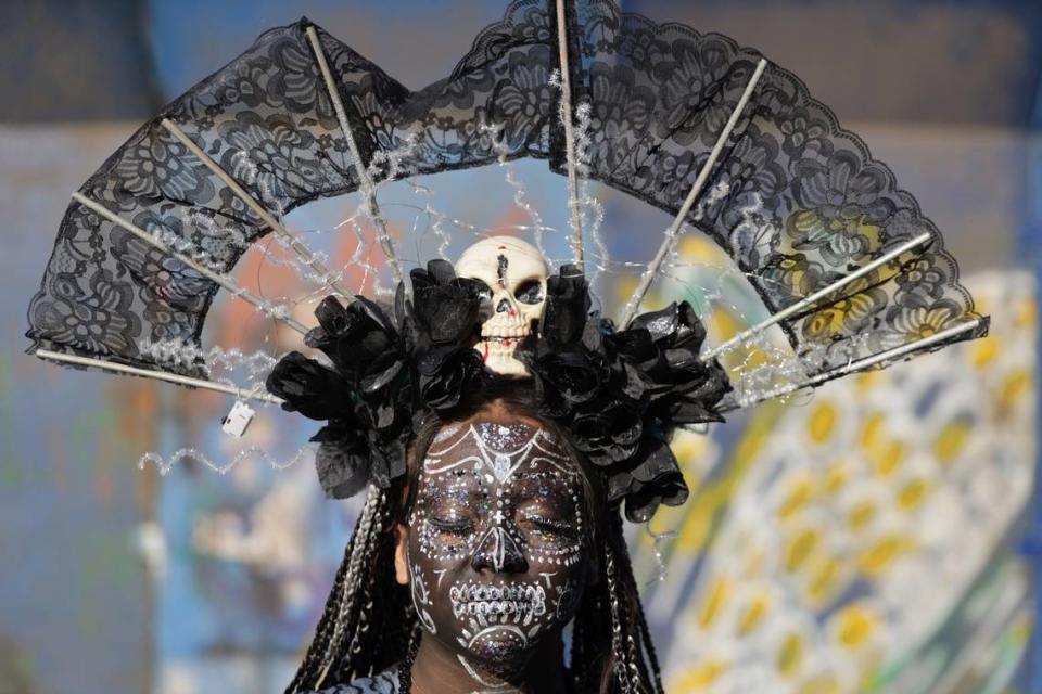 A woman dressed as a “Catrina” parades down Mexico City’s iconic Reforma avenue during celebrations ahead of the Day of the Dead in Mexico, Sunday, Oct. 22, 2023. 