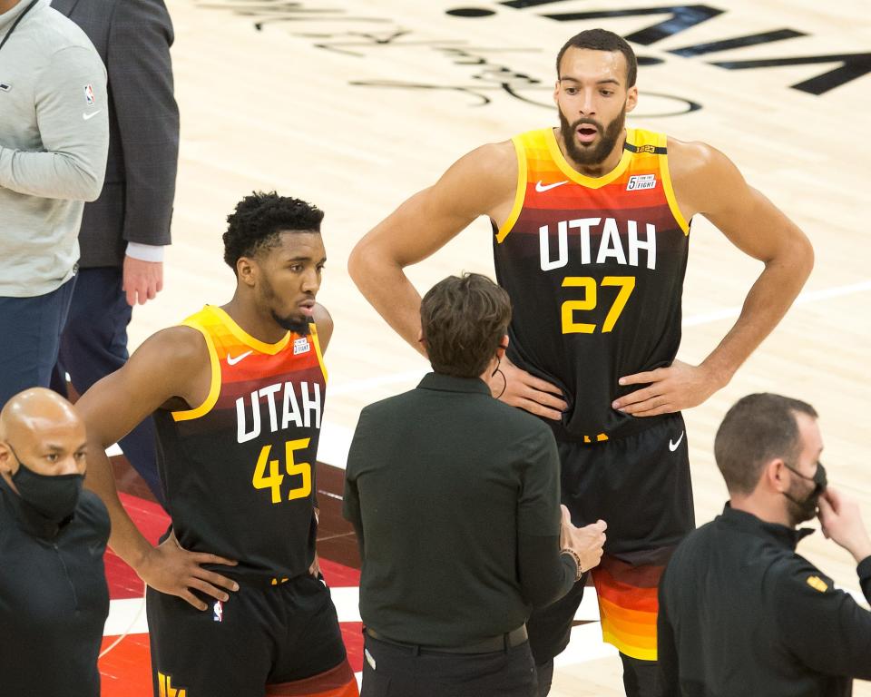 The Jazz finished with the NBA's best regular-season record last year. But can Donovan Mitchell (45) and Rudy Gobert (27) lead Utah to playoff success?