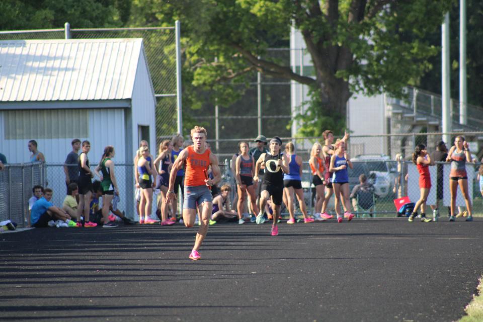 Tecumseh's Gavin Chenevey races to the finish during the Lenawee County Track and Field Championships at Sand Creek,