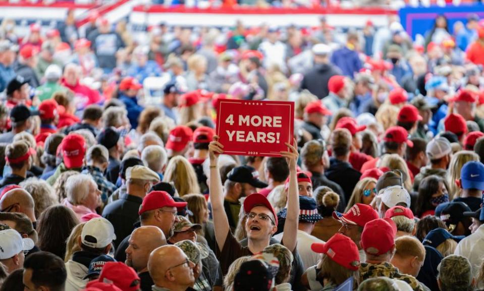 Many red hats were on display at Donald Trump’s rally in Freeland, Michigan, last week but few face masks.