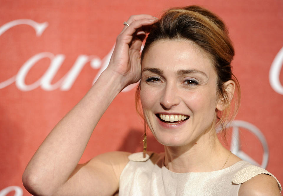 FILE - In this Jan.7, 2012 file photo, French actress Julie Gayet poses at the 2012 Palm Springs International Film Festival Awards Gala, in Palm Springs, Calif. French President Francois Hollande is threatening legal action over magazine report saying on Friday Jan.10, 2014 that he is having a secret affair with the French actress. Rumors have long circulated that Hollande might have a lover. The magazine Closer published images Friday showing his bodyguard and a helmeted man it says is Hollande visiting what it says is the apartment of the actress. (AP Photo/Chris Pizzello, File)
