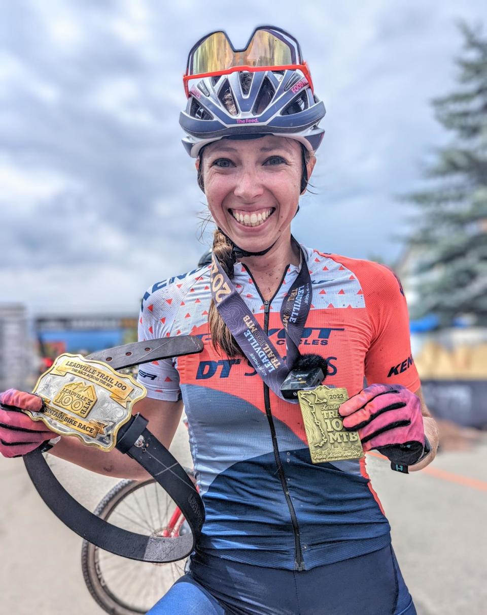 <span class="article__caption">A big belt buckle and an even bigger smile for Leadville champ Hannah Otto</span> (Photo: Life Time)