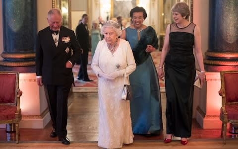 The Prince of Wales, Queen, Baroness Scotland and Theresa May at a Buckingham Palace dinner to celebrate the Commonwealth - Credit: PA