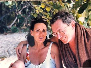 Norman Mintz and his wife, Marcia, on a Caneel Bay beach.