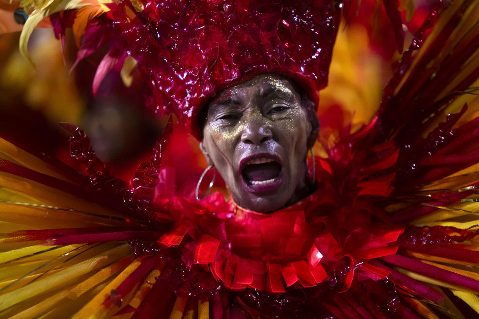 A dancer from the Grande Rio samba school performs in the Carnival parade at the Sambadrome in Rio de Janeiro, Brazil, early Monday, Feb. 12, 2024. (AP Photo/Bruna Prado)