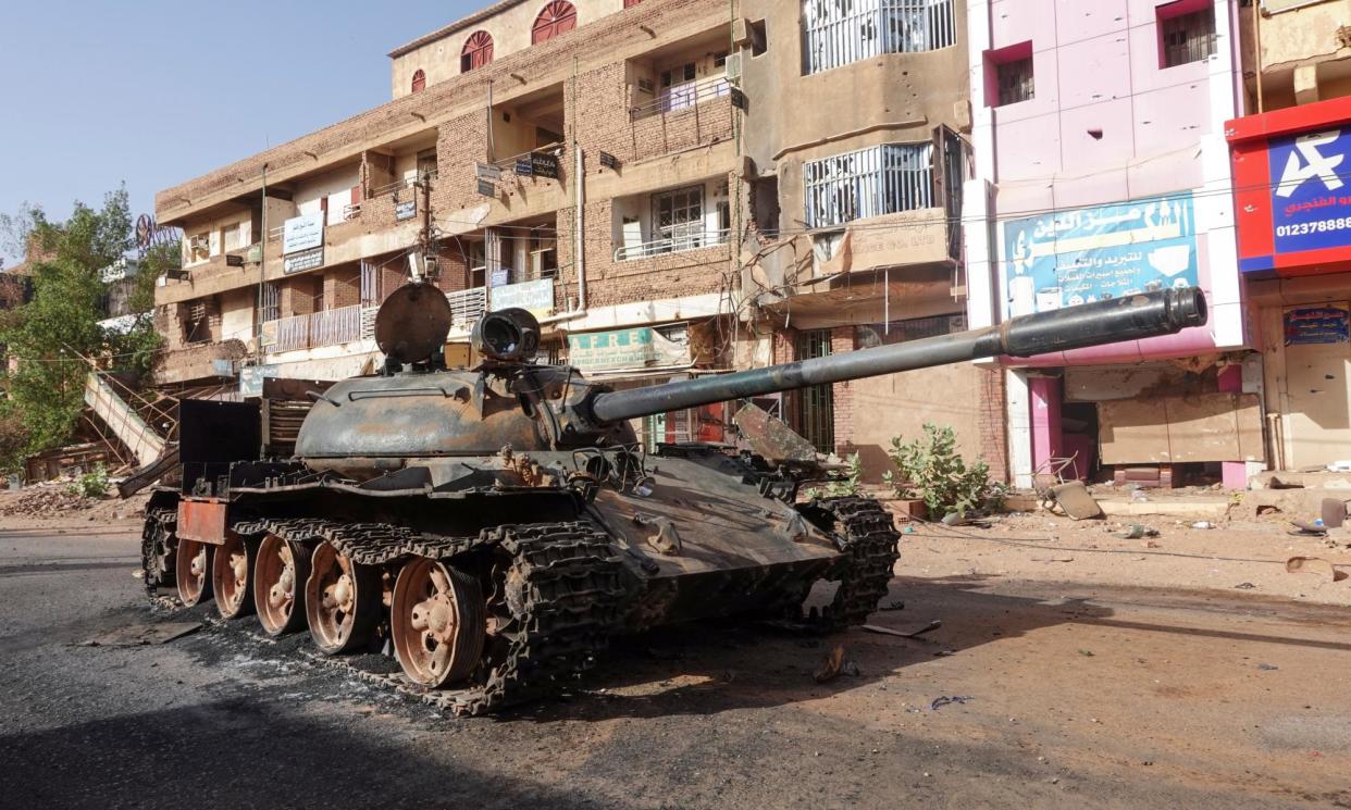 <span>A damaged army tank on the street in Omdurman, Sudan. </span><span>Photograph: El Tayeb Siddig/Reuters</span>