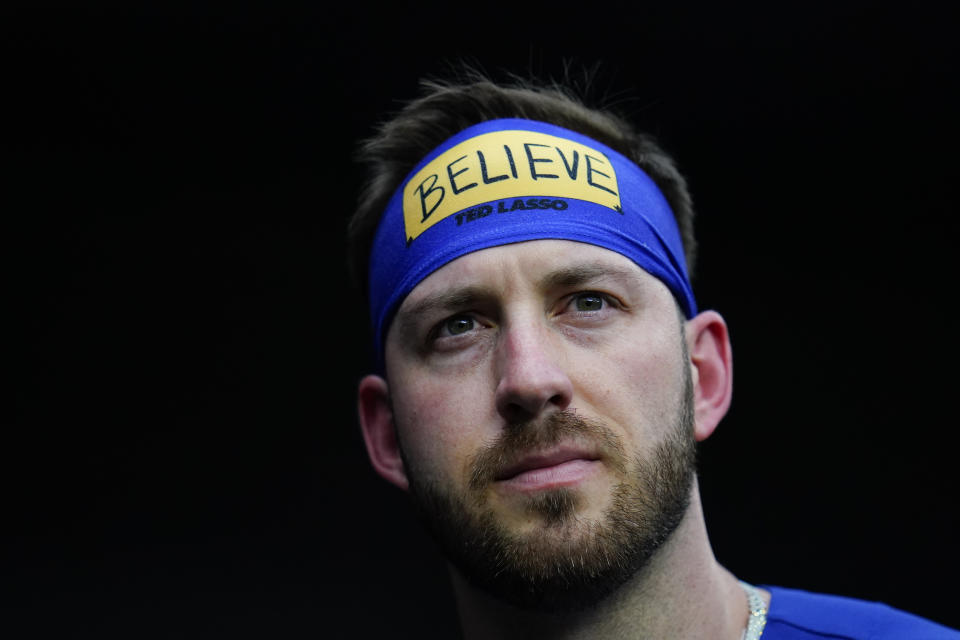 Texas Rangers' Mitch Garver looks on from the dugout during the first inning of a baseball game against the Baltimore Orioles, Wednesday, July 6, 2022, in Baltimore. (AP Photo/Julio Cortez)