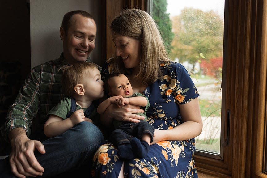 Capt. Durwood “Hawk” Jones, 37, of Albuquerque, pictured with his family, was identified Friday as the Air National Guard pilot who died in the plane crash in Michigan's Upper Peninsula on Tuesday.