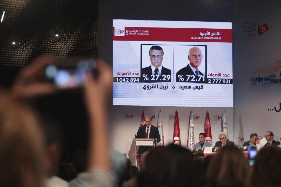 Journalists and observers attend as the Independent High Electoral Commission announces the results of the presidential election in Tunisia, Monday, Oct. 14, 2019. Tunisia’s electoral body said official preliminary results show that conservative, Islamist-backed law professor Kais Saied has largely won the presidential election. (AP Photo/Mosa'ab Elshamy)