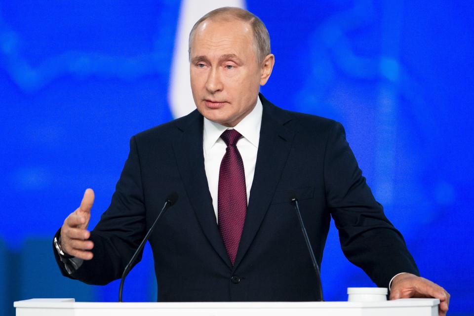 Russian President Vladimir Putin delivers a state-of-the-nation address in Moscow, Russia, Wednesday, Feb. 20, 2019. Putin sternly warned the United States against deploying new missiles in Europe, saying that Russia will retaliate by fielding new weapons that will take just as little time to reach their targets. (AP Photo/Alexander Zemlianichenko)