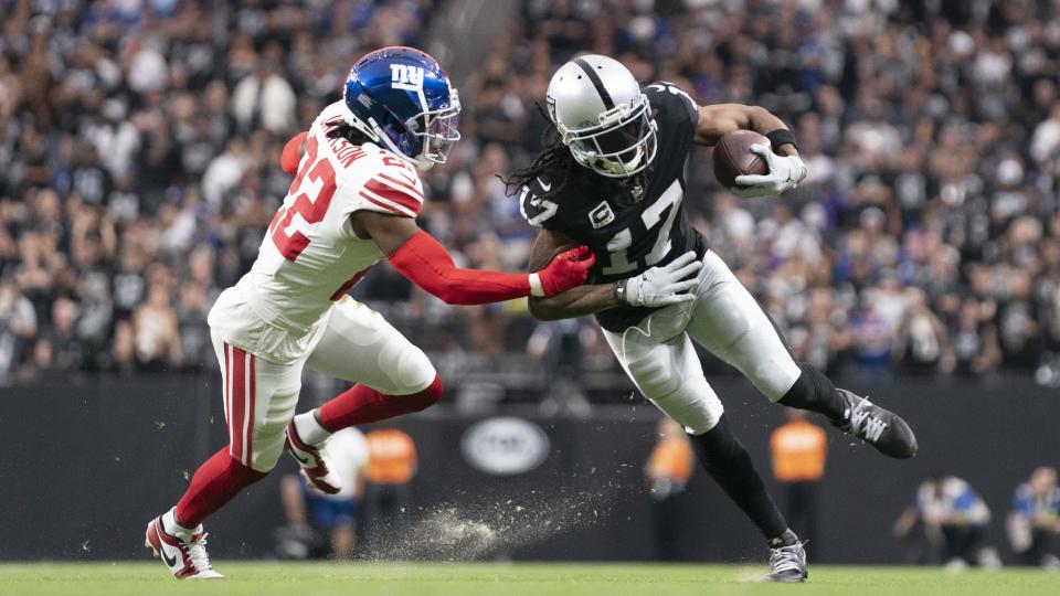 November 5, 2023; Paradise, Nevada, USA; Las Vegas Raiders wide receiver Davante Adams (17) runs the football against New York Giants cornerback Adoree' Jackson (22) during the second quarter at Allegiant Stadium. Mandatory Credit: Kyle Terada-USA TODAY Sports