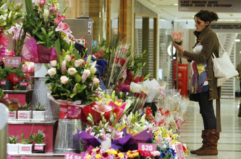 Australian woman shopping for flowers amid cost of living crisis