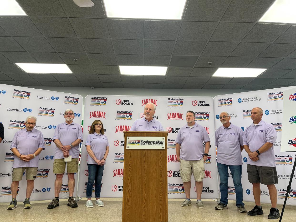 Boilermaker President Mark Donovan speaks with race officials and staff behind him during a post-race press conference at the Boilermaker headquarters on Monday, July 10, 2023 in Utica, NY