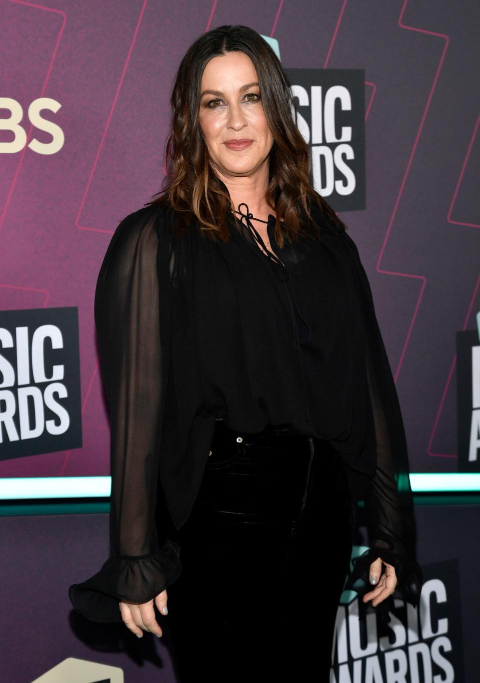 Alanis Morissette created the album “Jagged Little Pill” in 1995. It was transformed into a stage musical in 2018. She is seen at the CMT Music Awards in 2023.