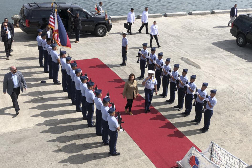 In this photo provided by the Philippine Coast Guard, U.S. Vice President Kamala Harris, center left, arrives for a vessel tour on board the Philippine Coast Guard BRP Teresa Magbanua (MRRV-9701) during her visit to Puerto Princesa, Palawan province, western Philippines on Tuesday, Nov. 22, 2022. Harris visited a western Philippines island province at the edge of the South China Sea on Tuesday to amplify America's support to its treaty ally and underline U.S. interest in freedom of navigation in the disputed waters, where it has repeatedly chastised China for belligerent actions. (Philippine Coast Guard via AP)