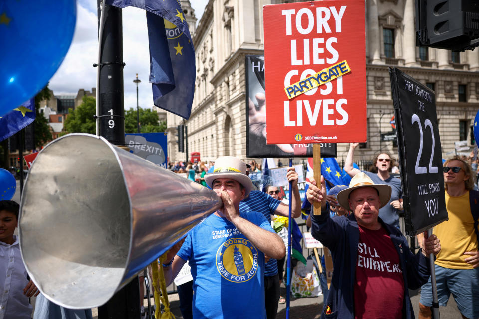 Demonstrators in London protest against British Prime Minister Boris Johnson.
