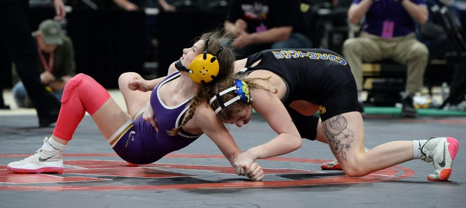 Smithsburg's Rileigh Romberger, left, tries to escape from Southern-Anne Arundel's Domenica Gladwell during the girls state final at 115 pounds. Gladwell won by decision, 8-1.