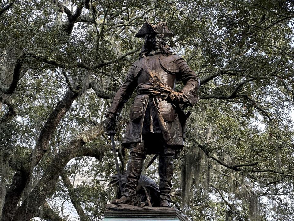 A statue of James Edward Oglethorpe stands in Chippewa Square in Savannah, Ga. on Feb. 9, 2024. Oglethorpe founded Georgia as the last of Britain's 13 American colonies in February 1733. Slavery was banned in the early years of Oglethorpe's Georgia, though the prohibition ultimately failed. A new book by Michael Thurmond, a Black veteran of Georgia politics and a history aficionado, argues that Oglethorpe deserves credit as a forefather of early abolitionists. (AP Photo/Russ Bynum)