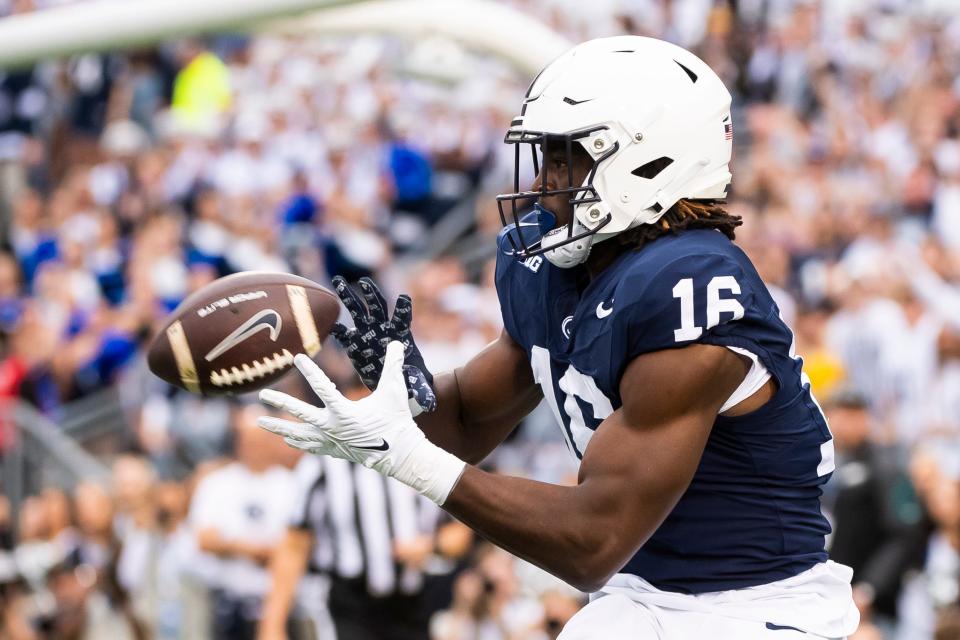 Penn State tight end Khalil Dinkins (16) catches a 9-yard pass in the end zone to score a touchdown in the first half of an NCAA football game against Indiana at Beaver Stadium Saturday, Oct. 28, 2023, in State College, Pa. The Nittany Lions won, 33-24.