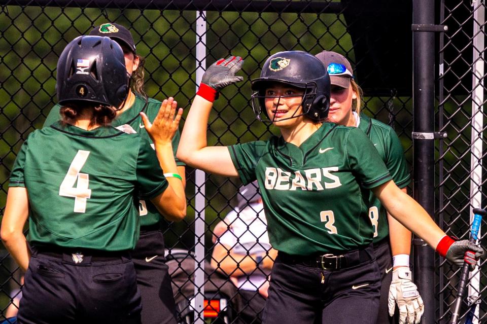 GNB Voc-Tech's Savanah Dubois (4) high fives Alexia Tsonis.