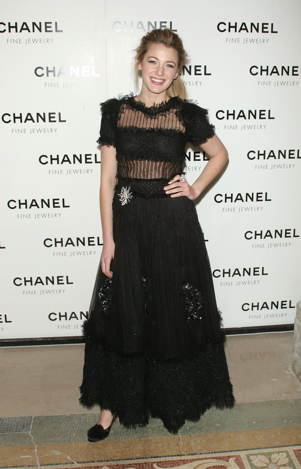 Como toda <em>celebrity </em>que se precie, la estrella es asidua a los diseños de Chanel. En 2008 asistió a un evento de la firma con un look semitransparente con pedrería. (Foto: Jim Spellman / Getty Images)