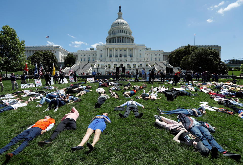 Activists mark the second anniversary of the Pulse Nightclub shooting where a gunman killed 49 people in Orlando with a die-in at the U.S. Capitol in Washington, U.S., June 12, 2018. | Kevin Lamarque—Reuters