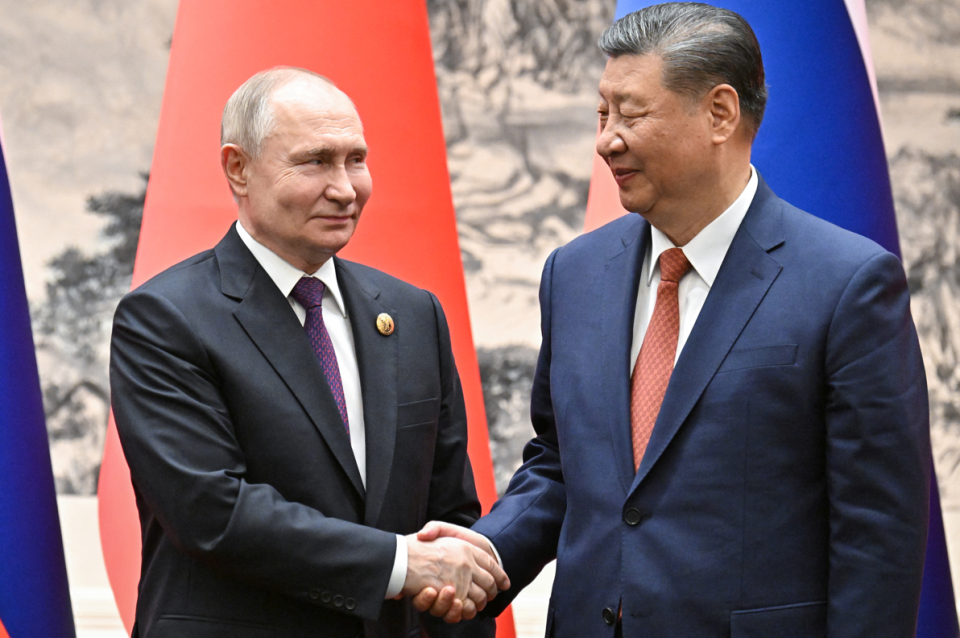 Russian President Vladimir Putin shakes hands with Chinese President Xi Jinping during a meeting in Beijing, China May 16, 2024.