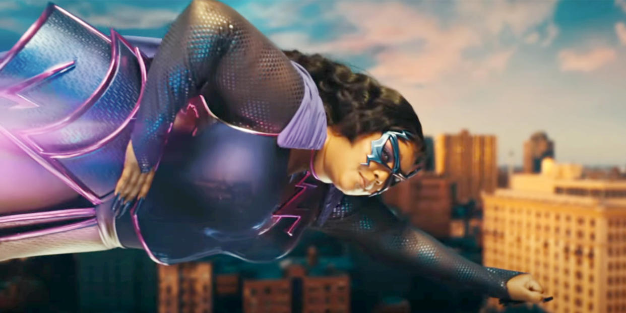 Lizzo dresses up as a superhero in the new music video to her song 