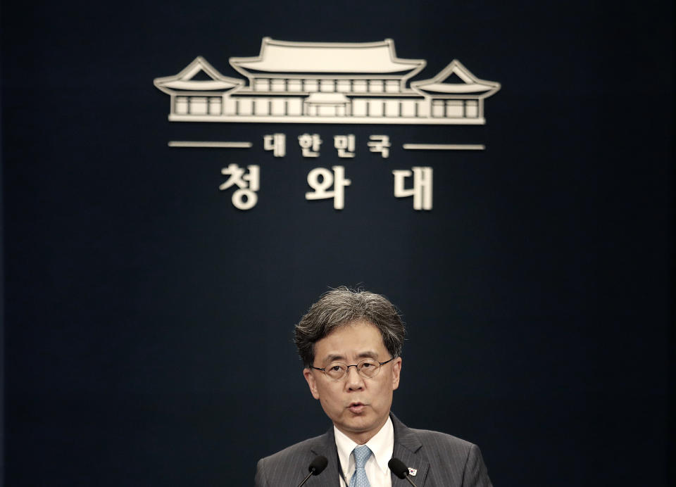 Kim Hyun-chong, deputy director of South Korea's presidential National Security Office, briefs on the South Korean government's stance on Japan's recent restrictions on its exports to South Korea at the presidential Blue House in Seoul, South Korea, Friday, July 19, 2019. Japan's Foreign Minister Taro Kono on Friday summoned South Korea's ambassador and accused Seoul of violating international law by refusing to join in an arbitration panel to settle a dispute over World War II forced labor. The sign reads: " Presidential Blue House." (AP Photo/Ahn Young-joon)