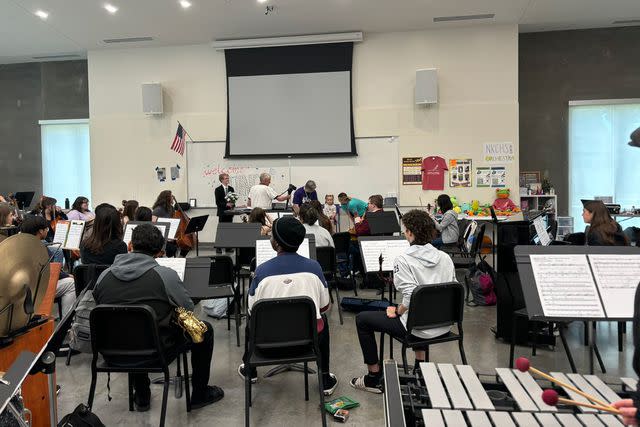 <p>Hawar Khalandi</p> High school orchestra performs for Quincy Fitzgerald