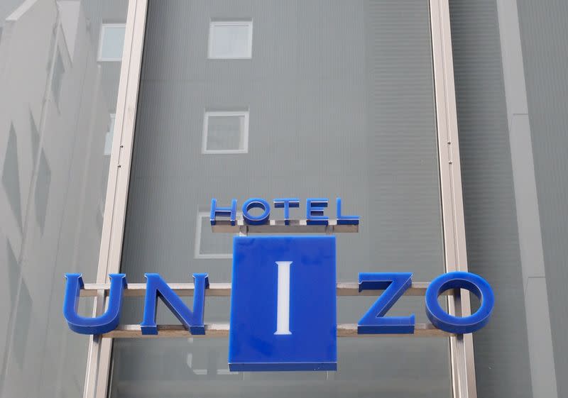 The logo of Hotel Unizo, operated by Japanese hotel operator Unizo Holdings, is seen at the entrance of the hotel in Tokyo, Japan