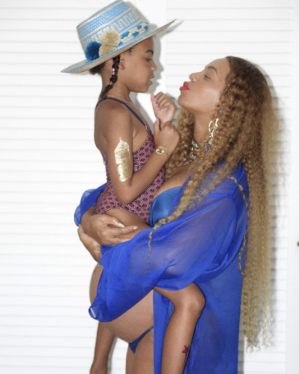 <p>Bathing suit or negligee? It’s hard to know, but whatever it was gave us a view of that bare bump while she held Blue Ivy, 5, in her arms. (Photo: <a rel="nofollow noopener" href="https://www.instagram.com/p/BUtPRfzg3-e/?taken-by=beyonce&hl=en" target="_blank" data-ylk="slk:Beyoncé via Instagram;elm:context_link;itc:0;sec:content-canvas" class="link ">Beyoncé via Instagram</a>) </p>