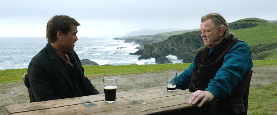 Colin Farrell and Brendan Gleeson drink beer near each other
