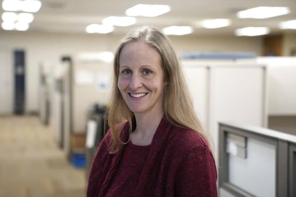 Researcher Kara Zivin stands for a portrait in Ann Arbor, Mich., Monday, Nov. 7, 2022. Zivin co-authored a study published in 2021 that found that suicidal thoughts and behavior among commercially insured U.S. individuals before, during and after pregnancy were rising. The rates were low, but they increased among those with anxiety or depression from 1 per 10,000 in 2006 to almost 3 per 10,000 in 2017. (AP Photo/Paul Sancya)