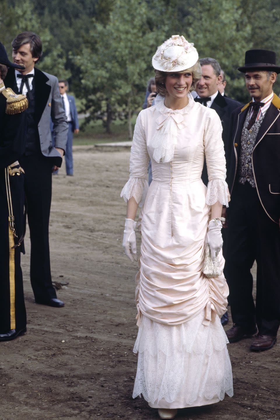 <p>Princess Diana dressed in a traditional blush pink Klondike outfit while on an official visit to Canada.</p>