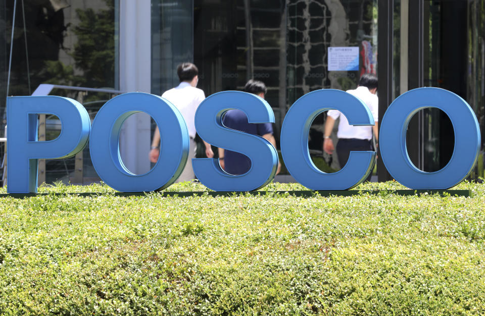 A logo of Posco is seen outside of Posco Center in Seoul, South Korea, on July 22, 2021. A government-affiliated foundation in South Korea will likely handle reparations to forced labor victims with money contributed by steel giant POSCO and other local companies that benefited from the 1965 accord. POSCO said Wednesday, March 15, 2023, that it decided to newly contribute 4 billion won ($3 million) to the foundation in addition to the 6 billion won ($4.6 million) that it has previously contributed to the foundation. (Bae Hun-shik/Newsis via AP)
