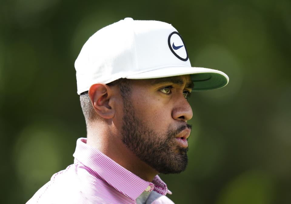 Tony Finau, of the United States, walks down the fairway after his tee shot on the 17th hole during round three of the Canadian Open golf tournament at St. George's Golf and Country Club in Toronto, Saturday, June 11, 2022. (Nathan Denette/The Canadian Press via AP)