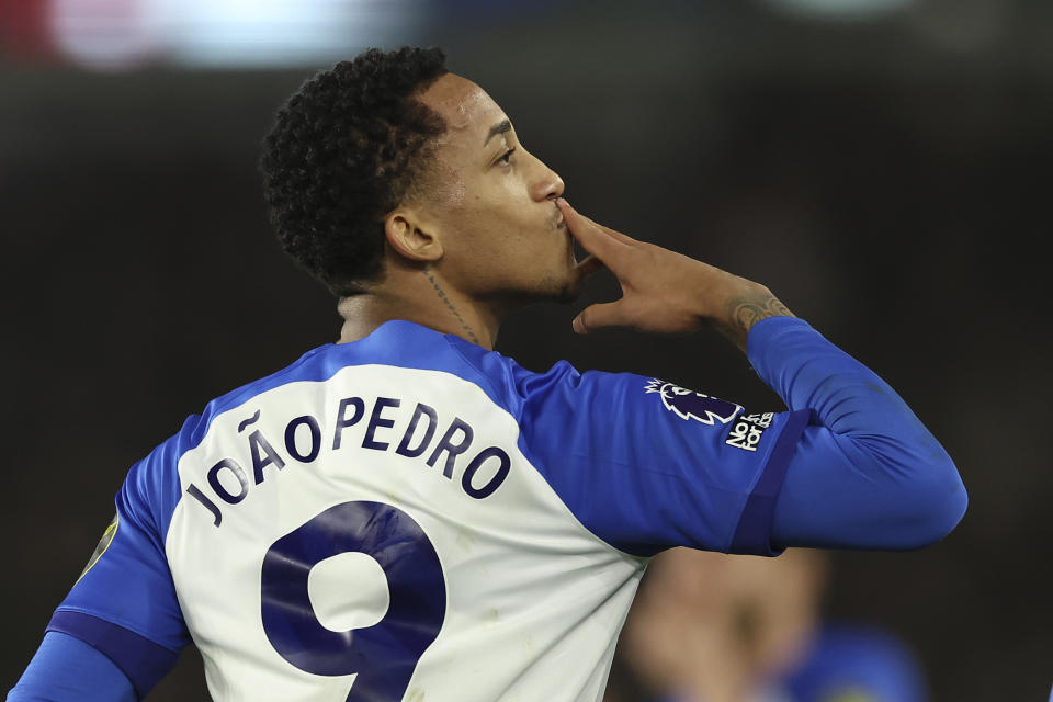 Brighton's Joao Pedro celebrates after scoring his side's second goal from the penalty spot during the English Premier League soccer match between Brighton & Hove Albion and Tottenham Hotspur at the Amex stadium in Brighton, England, Thursday, Dec. 28, 2023. (AP Photo/Ian Walton)