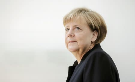 German Chancellor Angela Merkel arrives to sign a book of condolence for former Israeli President Shimon Peres at the embassy of Israel in Berlin, Germany, September 30, 2016. REUTERS/Michael Kappeler/POOL