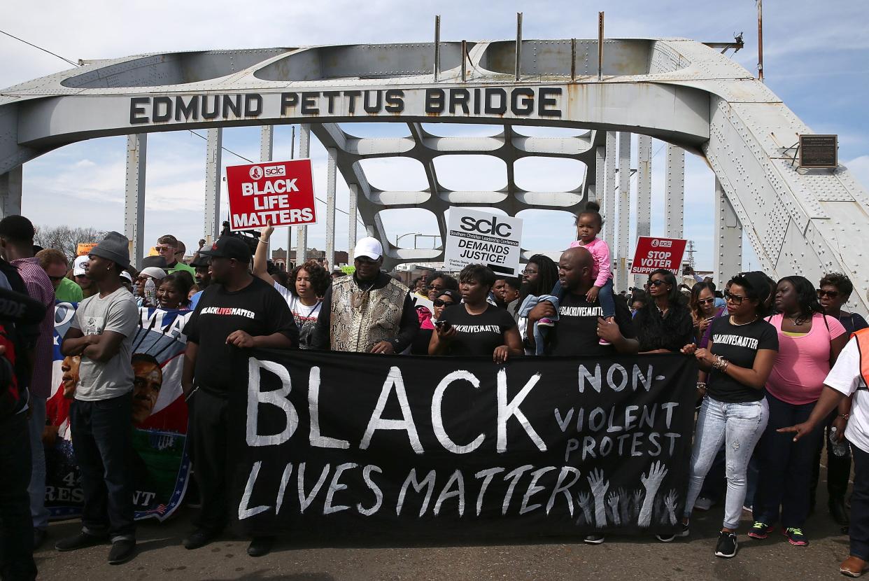 Thousands of people walk across the Edmund Pettus Bridge during the 50th anniversary on March 8, 2015, in Selma, Alabama. This year marks the 56th anniversary, and commemorations will be held remotely because of the coronavirus pandemic. (Photo: Justin Sullivan via Getty Images)