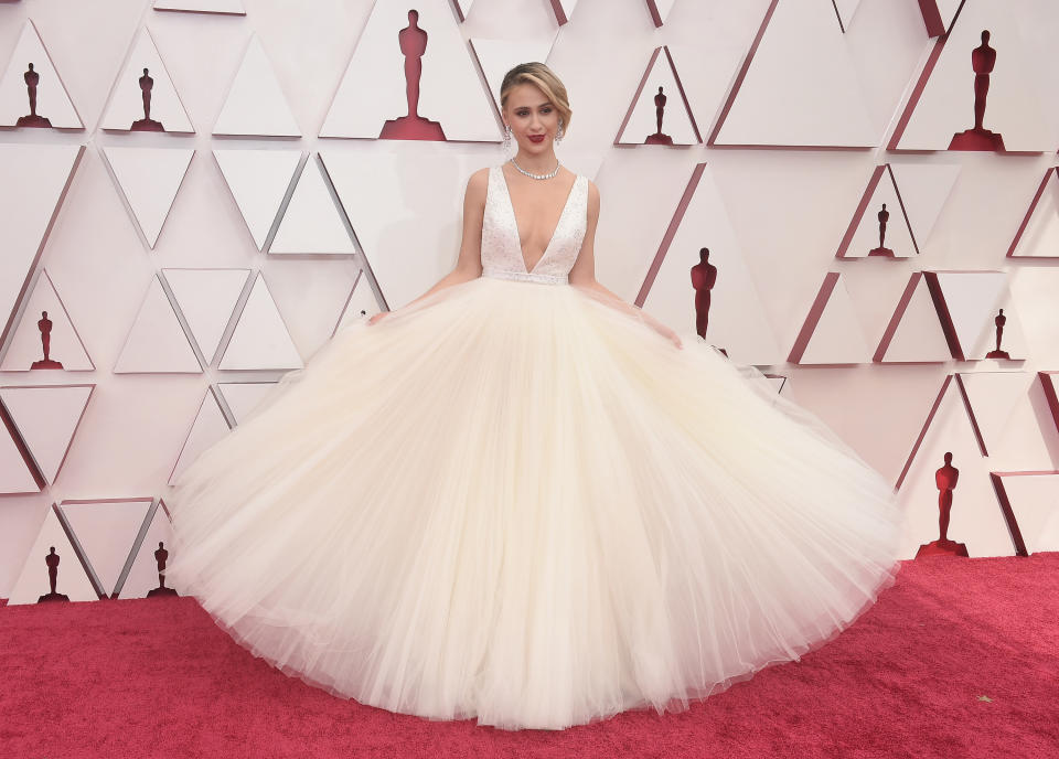 A princess ballgown with a plunging neckline and a large tulle skirt