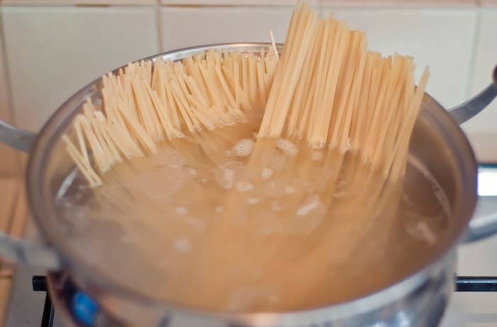 spaghetti boiling in a large pot