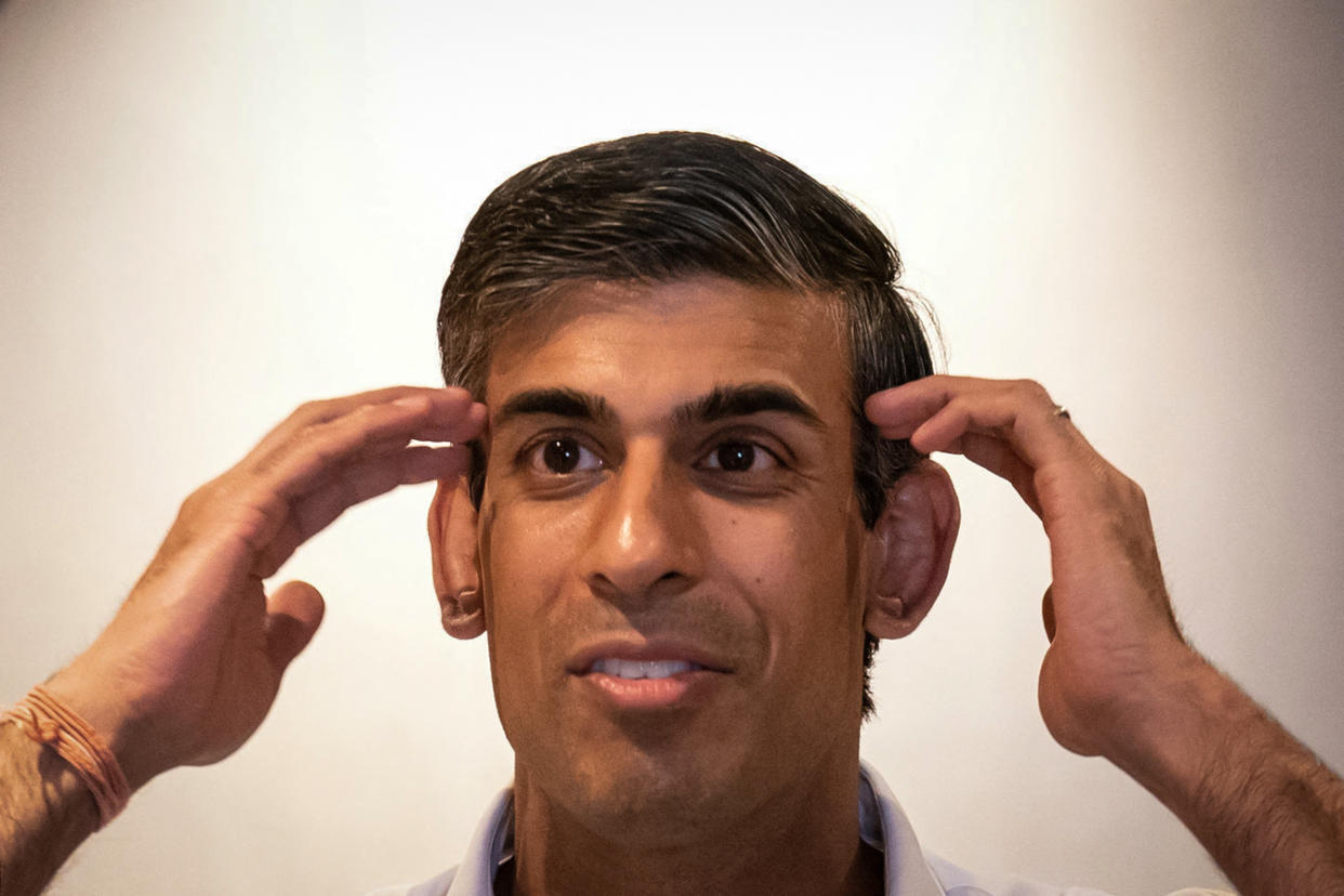 Britain's former chancellor to the exchequer and candidate to be the Leader of the Conservative Party, and Britain's next Prime Minister Rishi Sunak, gestures as he delivers a speech during a campaign event in Newmarket, on July 27, 2022. - Rishi Sunak and Liz Truss are contesting a run-off to be the Conservatives' new leader, and thereby prime minister, with the ruling party's approximately 200,000 members set to vote next month. The winner to replace outgoing Prime Minister Boris Johnson will be announced on September 5, 2022. (Photo by Joe Giddens / POOL / AFP) (Photo by JOE GIDDENS/POOL/AFP via Getty Images)